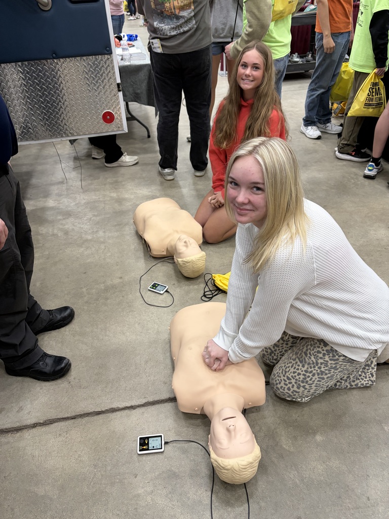 students learning CPR