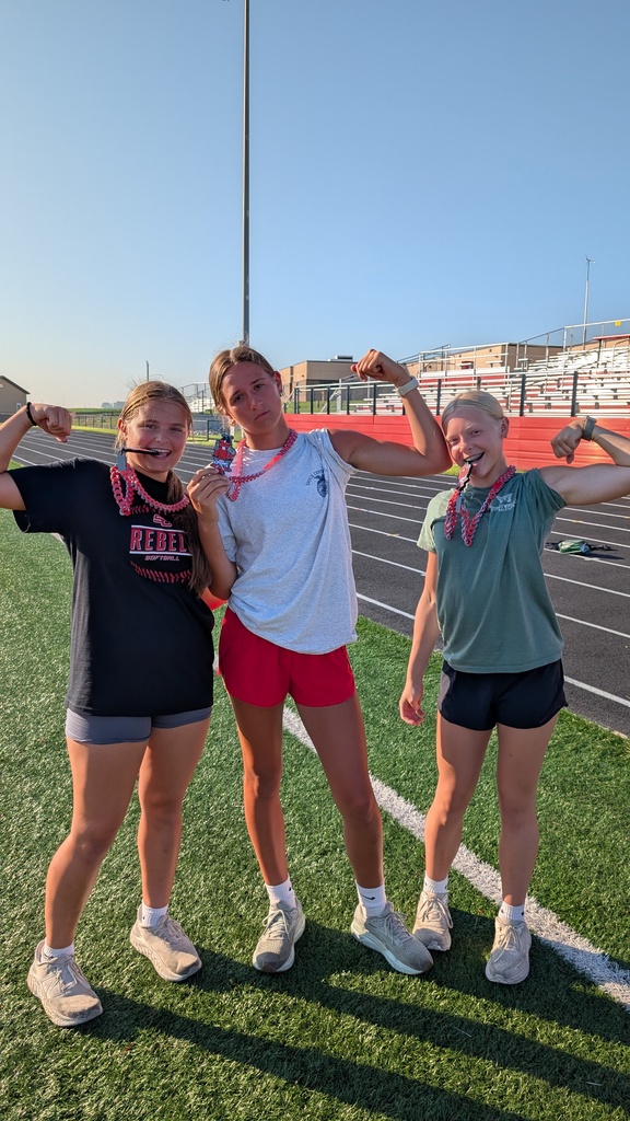 Students posing on football field