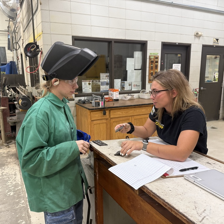 Carter instructing EHS student 