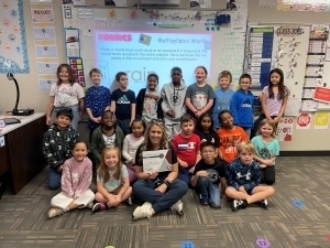 Jordyn Lapierre and students pose for class photo