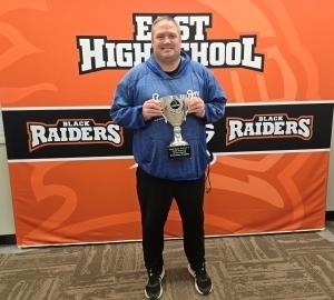 Kurt Bremer in front of EHS backdrop