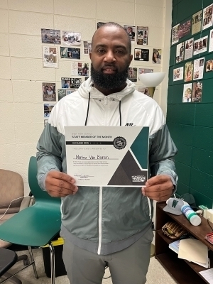 Martez Van Buren poses with certificate