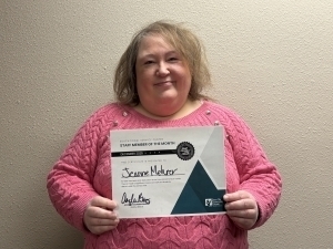 Jeanne Mehrer poses with certificate