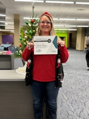 Wendy Bryce poses with certificate