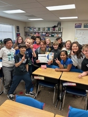 Wendy Johnson poses with her class