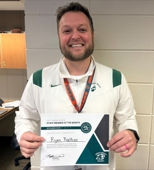 Ryan Prather poses with a certificate