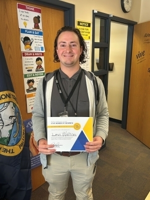 Levi Walton holding certificate