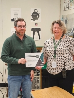 Benjamin Hunnel and Pam Husk pose for a photo