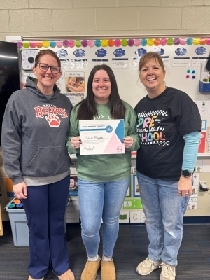 Staci Fagan poses with two colleagues