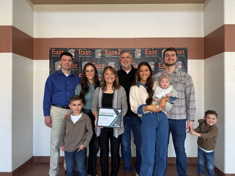 Kate Albrecht Poses with Family