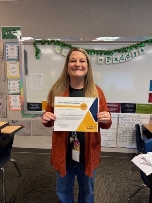 Hannah Strand poses with certificate