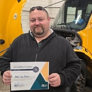 Heath Van Roekel poses with a certificate