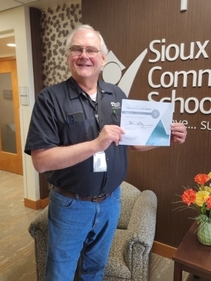 Bill LePay poses with a certifcate