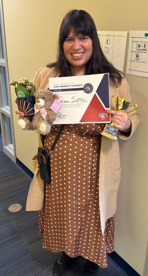 Teresa Sutton holds a certificate