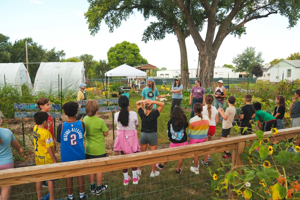 Dan talks to students from Eugene Field about gardening