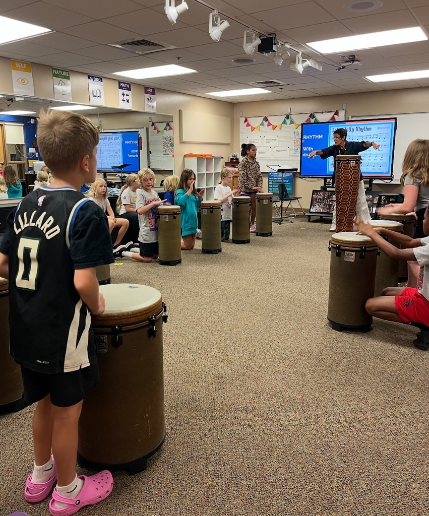 4th graders drumming in the music room 