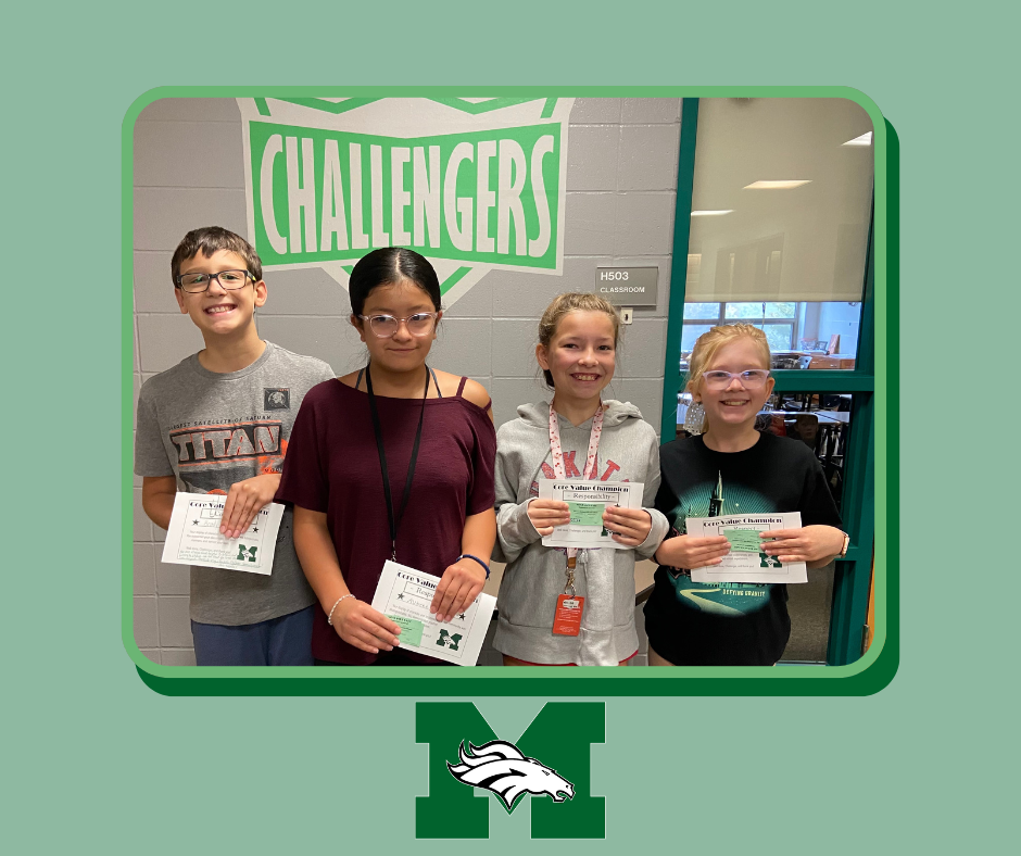 Four smiling Memorial Middle School students stand in a school hallway in front of a large green "Challengers" sign. The students—a boy in a blue hoodie and three girls—proudly hold up their "Core Value Champion" award certificates. 