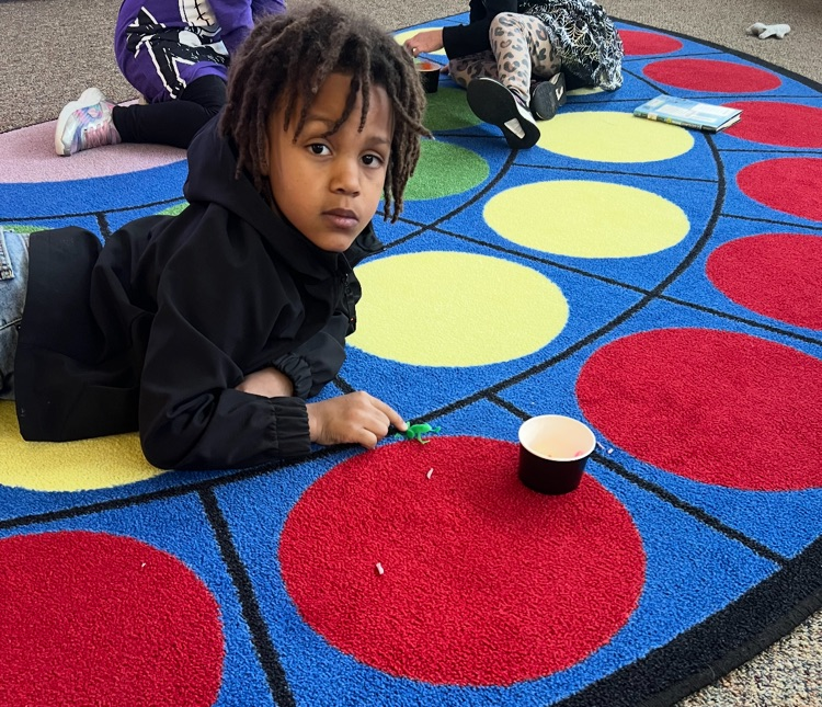 a student looking at the camera