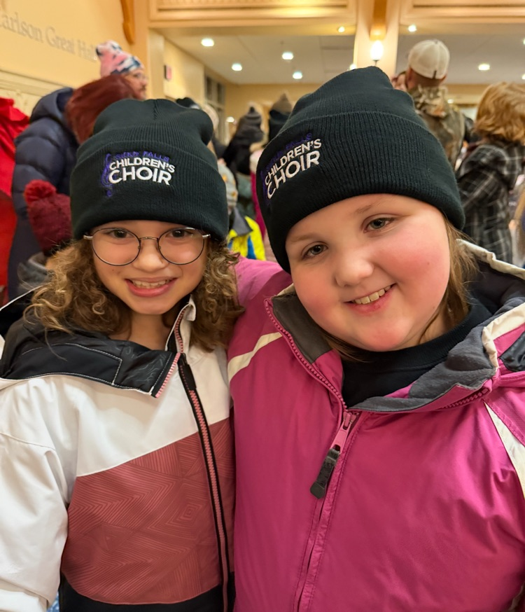 students singing with the children’s choir