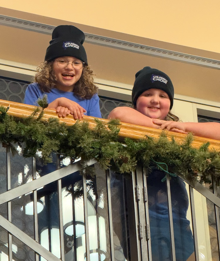 students singing with the children’s choir