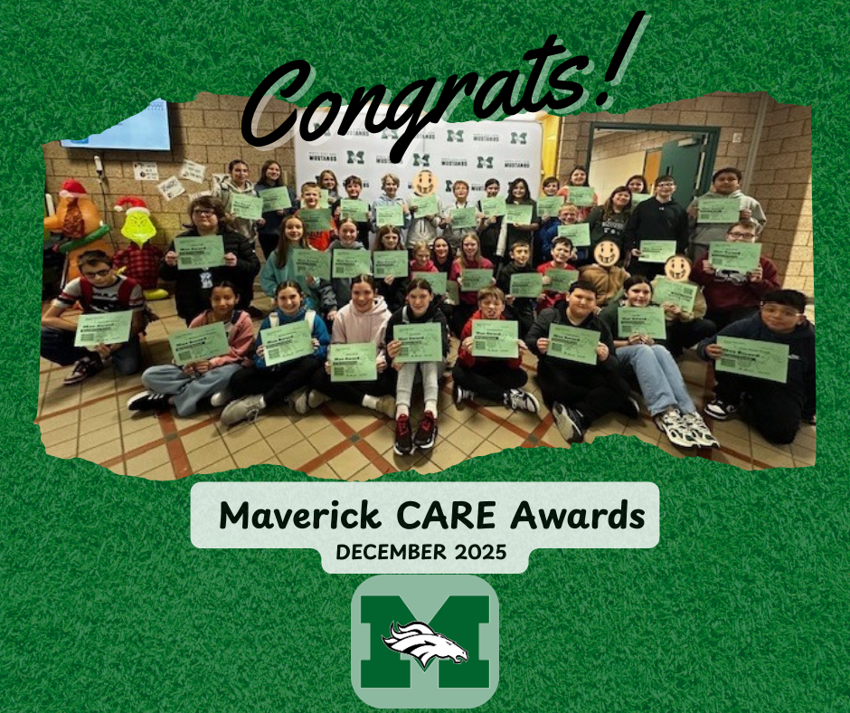 A large group of 6th-grade students from the Mavericks team gathered for a rally. The students are in three rows, holding certificates, smiling proudly.