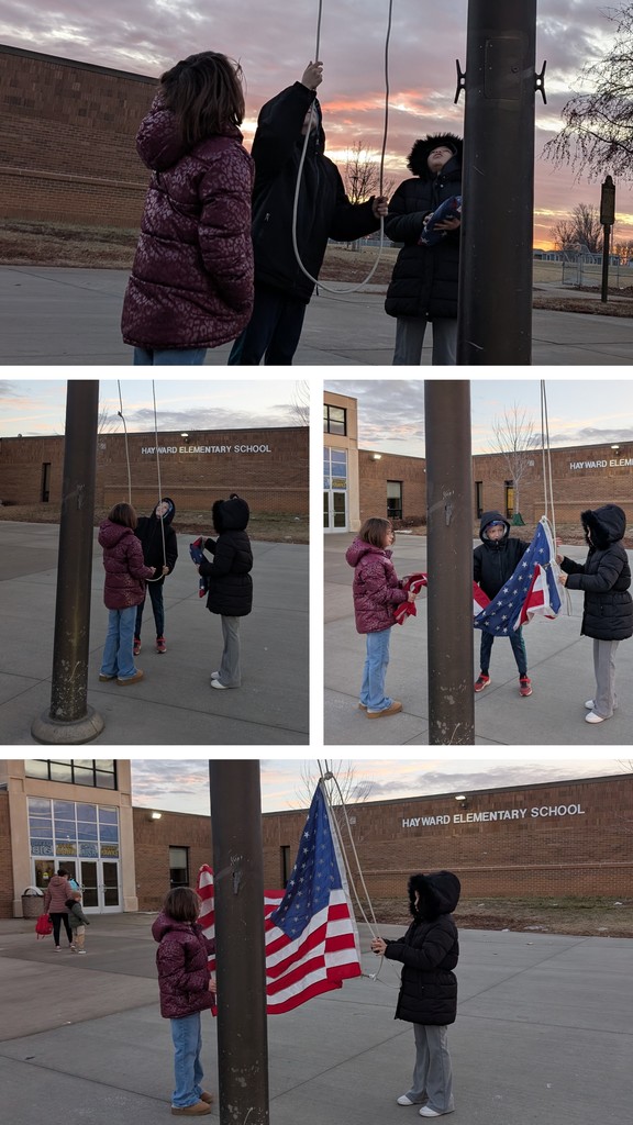 4th grade students raising the flag 