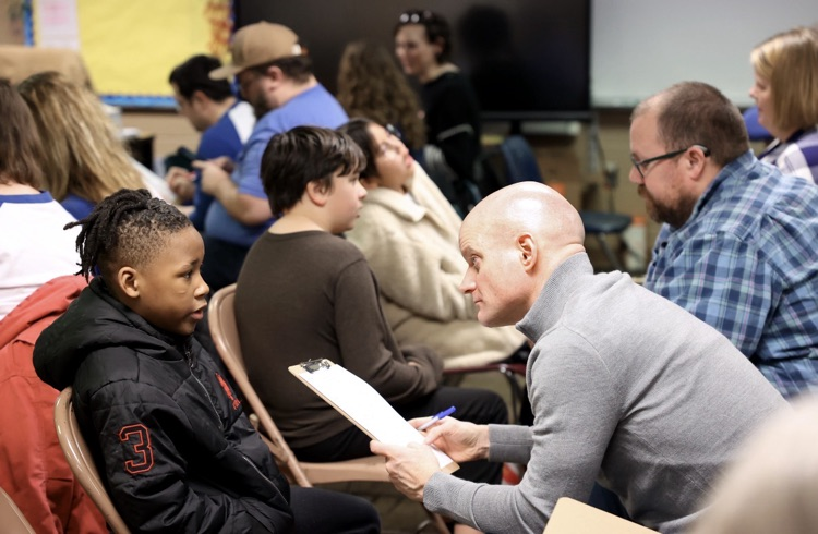 students and adults participating in the smart bowl 