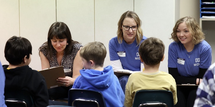 students and adults participating in the smart bowl 