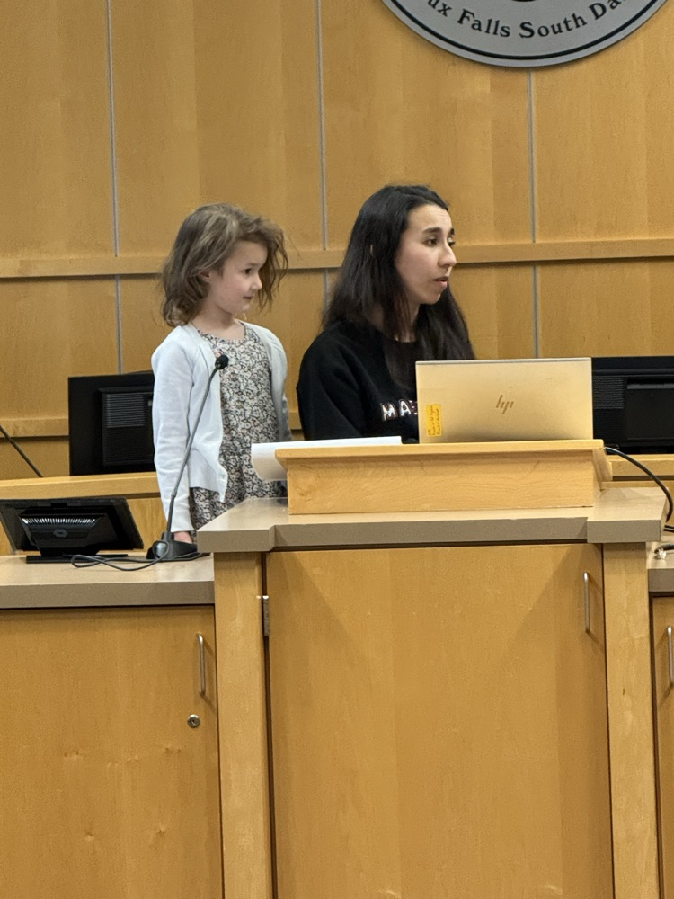 Señorita García and Autumn sharing at the Spanish Advisory Mtg