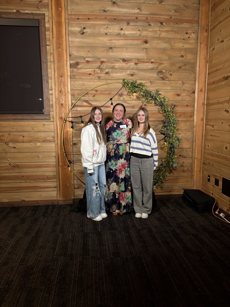 Mrs. Kruse and the two students who nominated her for teacher of the year. 