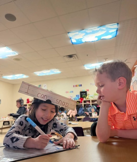 students playing UFLI  writing game