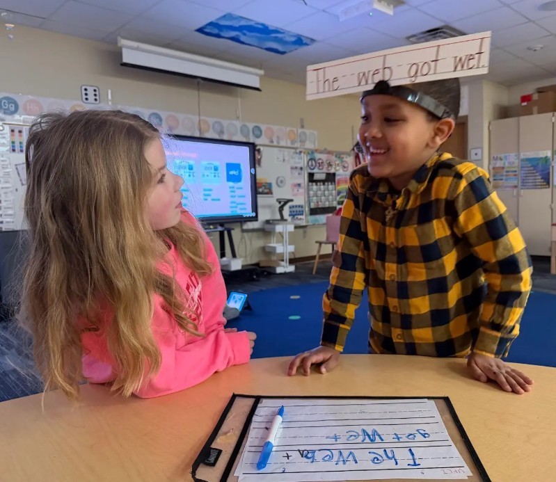 students playing UFLI  writing game