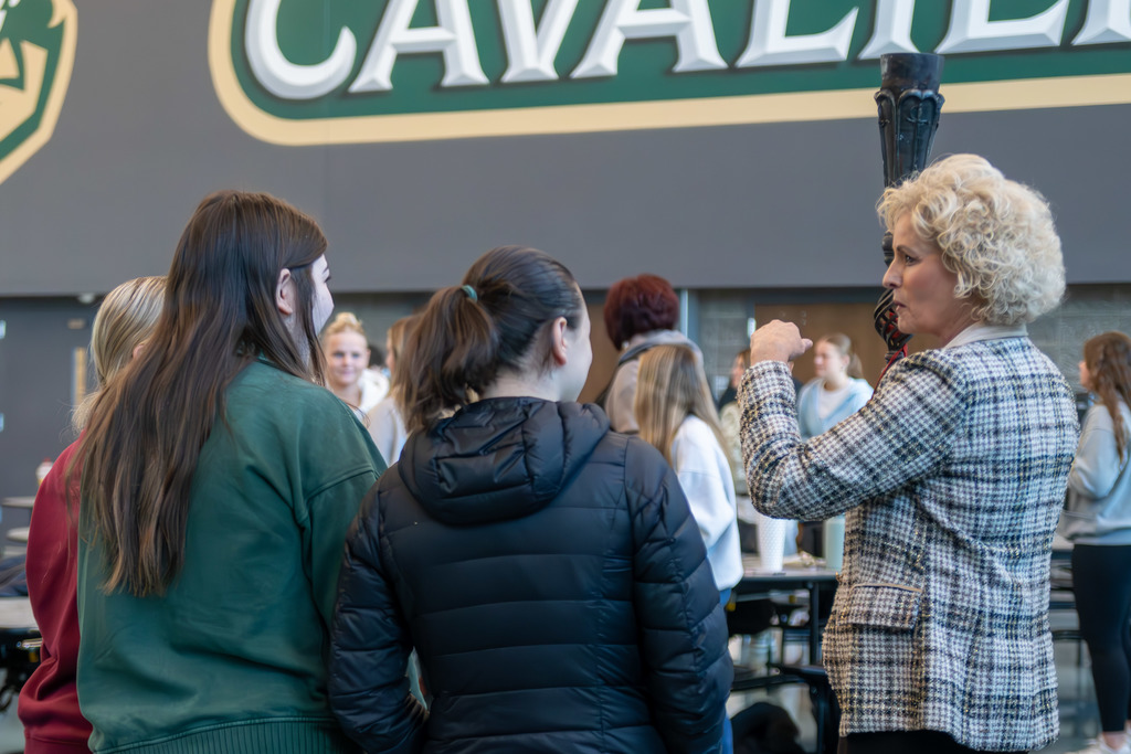 Survivor 21 contestant Holly Hoffman speaking with a group of JHS students