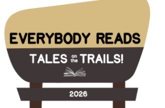 Everybody reads tales on the trails hiking sign.