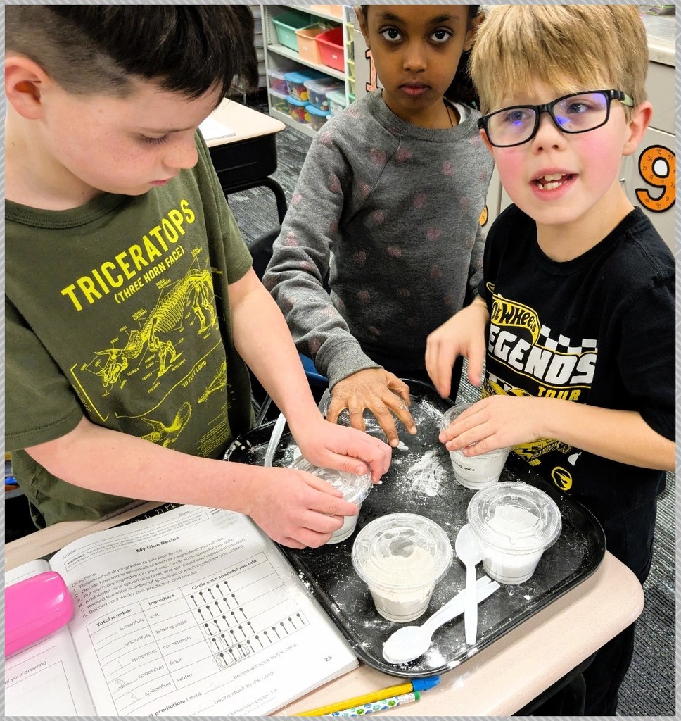 Second grade students making glue. 