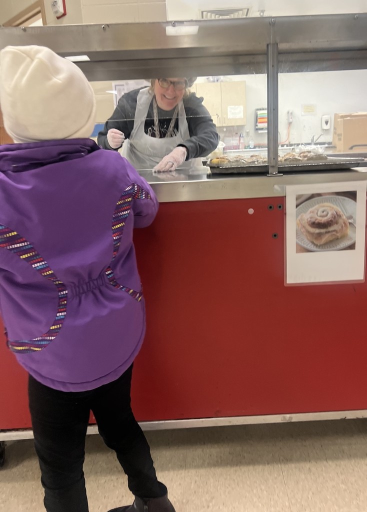 Mrs. Jones helping serve lunch