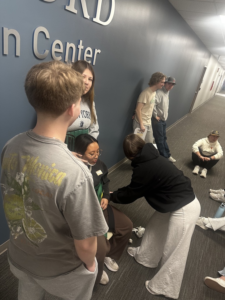 EMT students practicing KED board skill