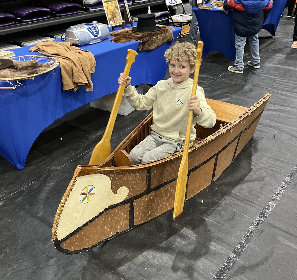 boy in a canoe