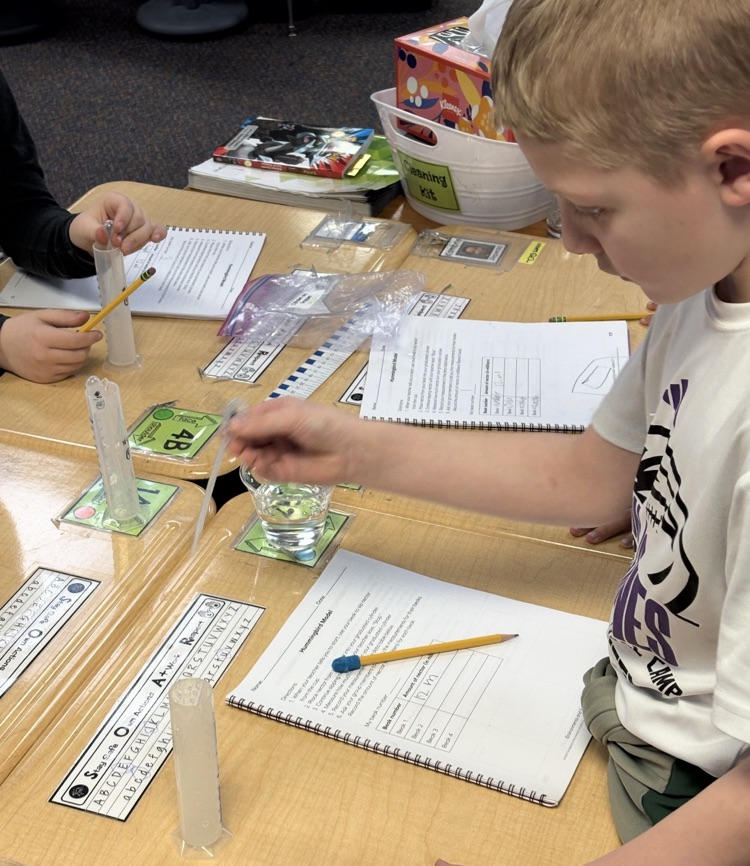 student working on a science experiment