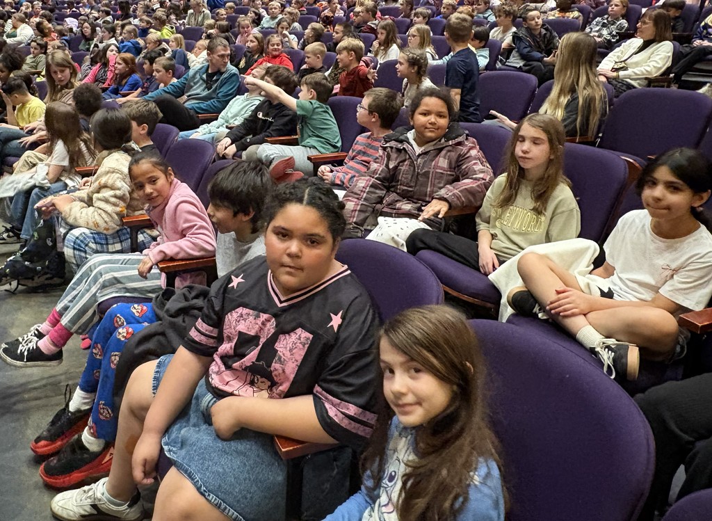 3rd graders waiting for the Young People's Concert to begin