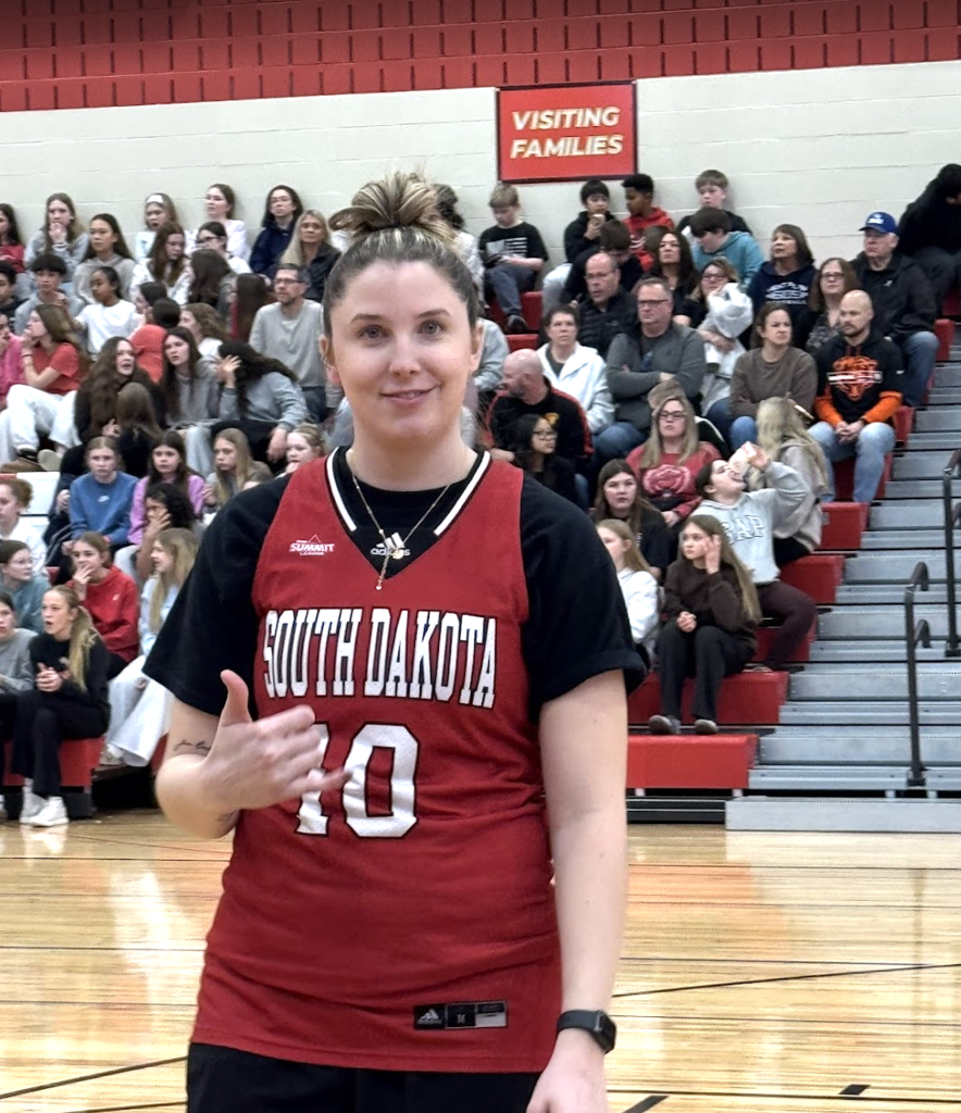 Ms. Hansen wore her USD jersey from when she played at the game today.