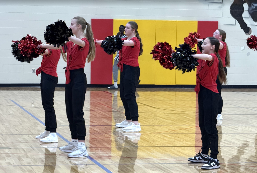 The cheer team came out to perform at half time for everyone. They did outstanding!