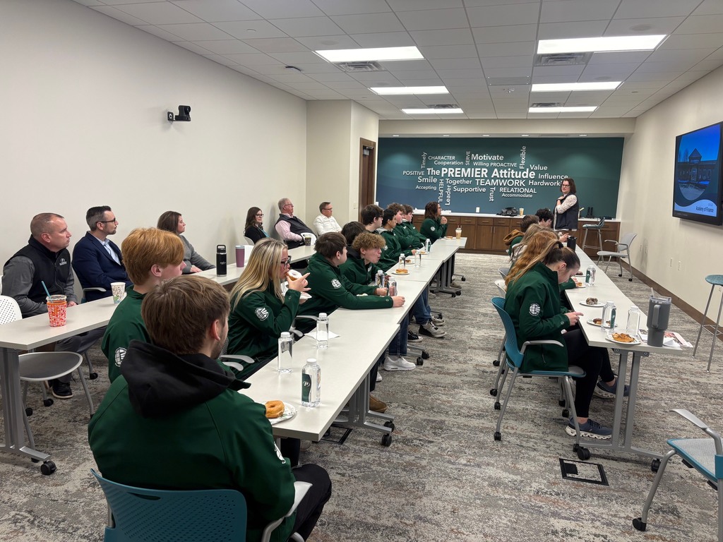 Academy of Finance and Exploration students listening to Premier Bank guest speakers