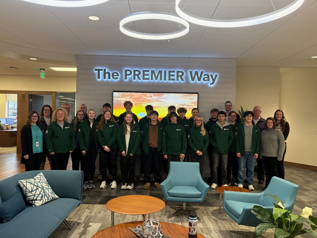 All students and Premier Bank guest speakers posing for a picture