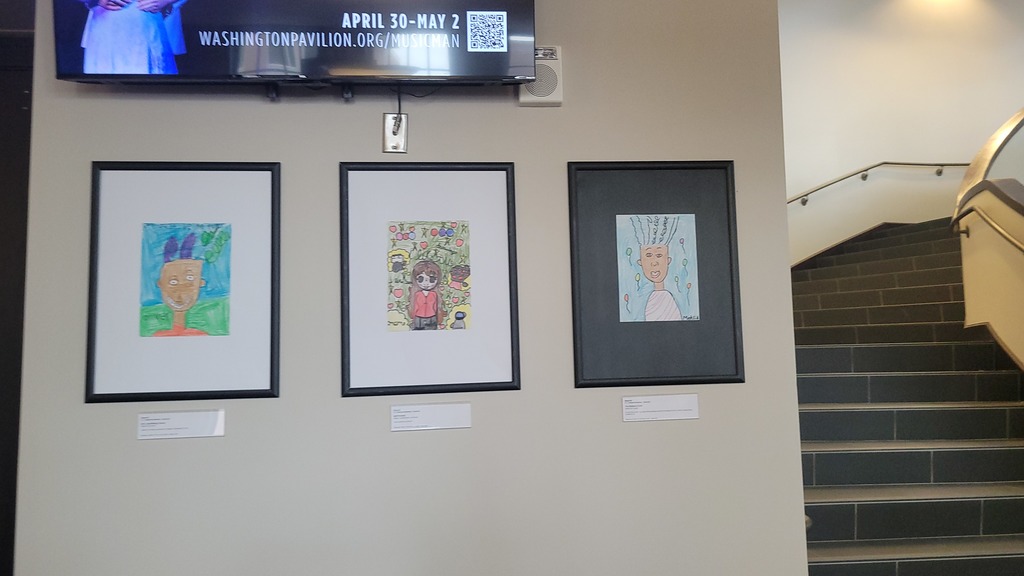 student artwork displayed on a wall