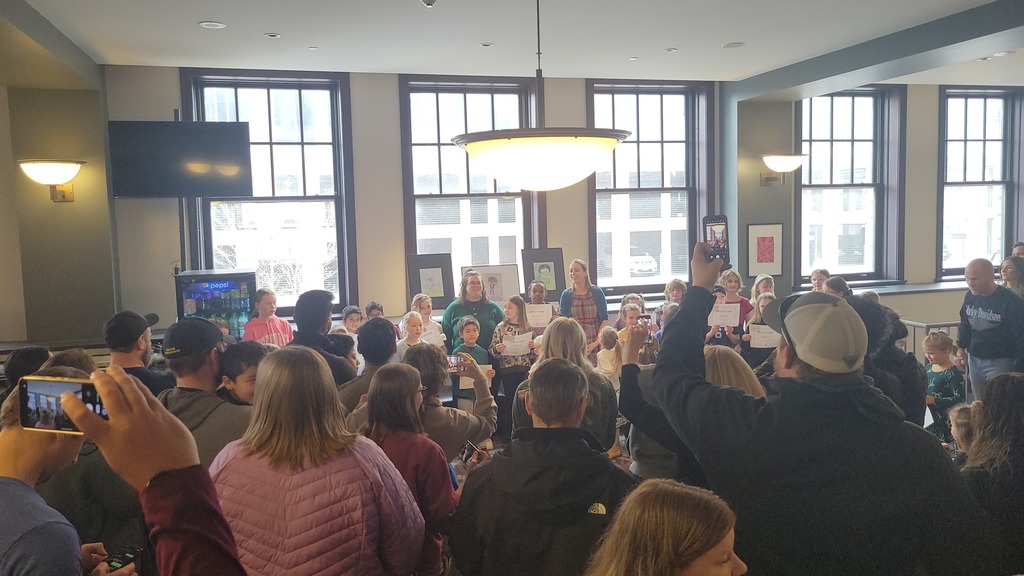 students at an art show