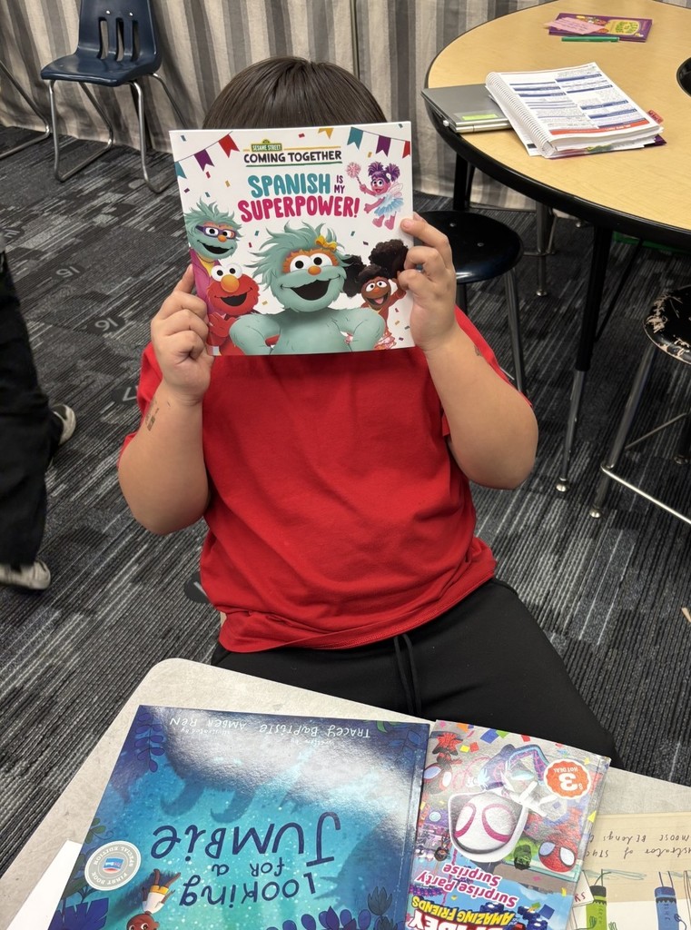 1st grade students enjoying their new books!