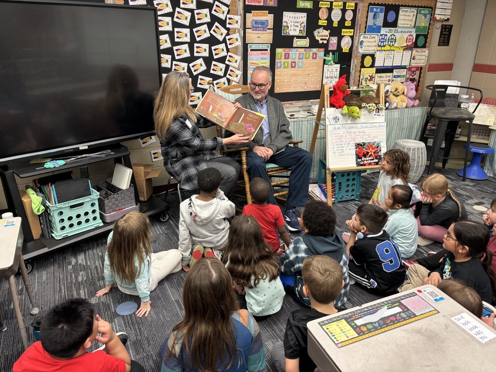 1st grade students enjoying their new books!