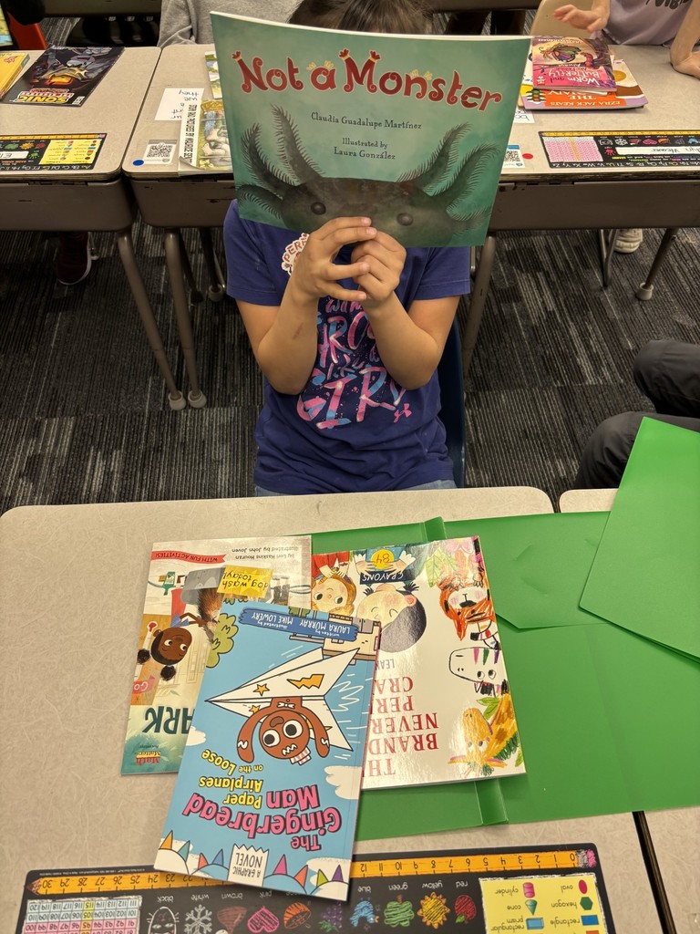 1st grade students enjoying their new books!