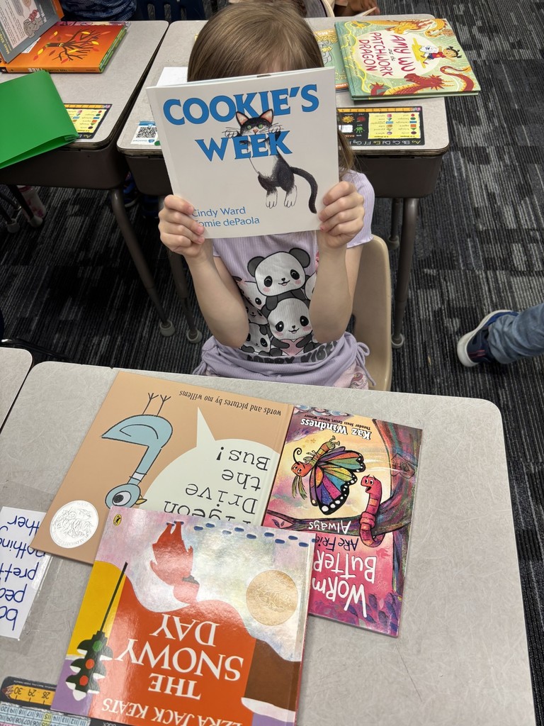 1st grade students enjoying their new books!